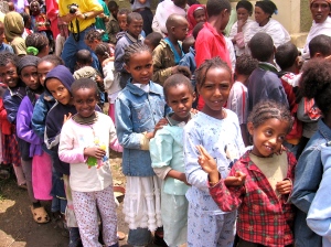 Children at the local feeding program (which serves over 400+ children in the community)